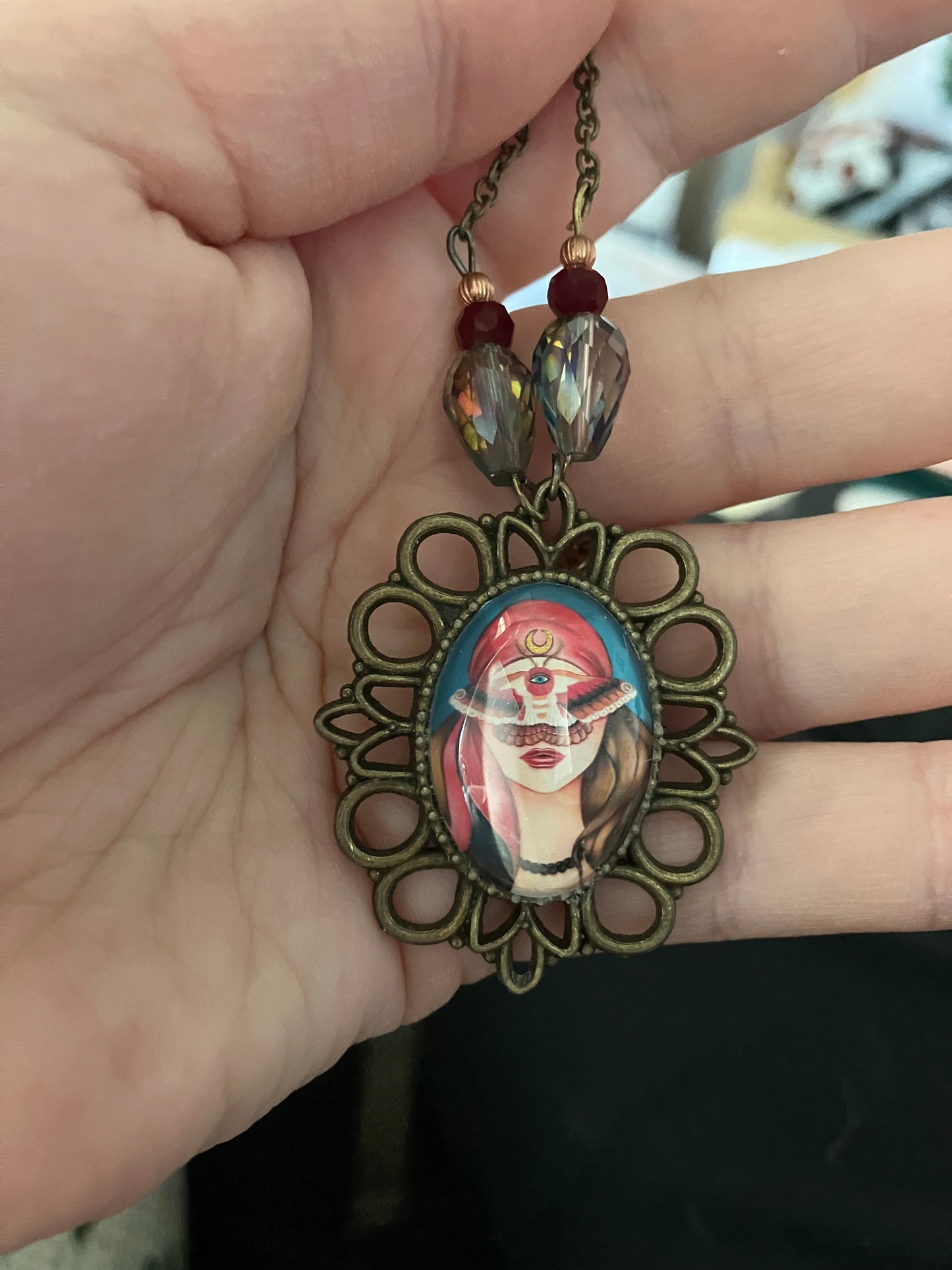 Moth Girl Necklace with irredescent and red stones